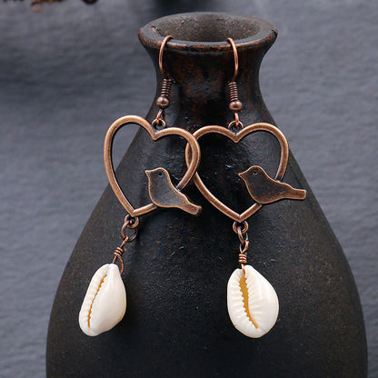 Round hollow shell love earrings