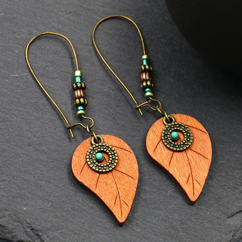 Round hollow shell love earrings