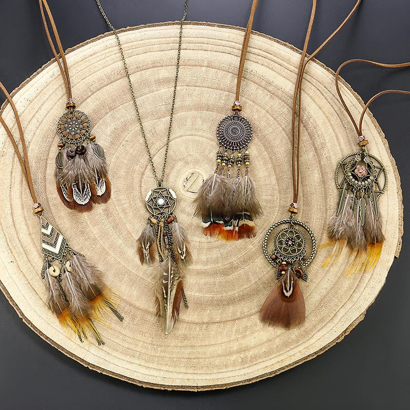 Vintage hollow round feather necklace