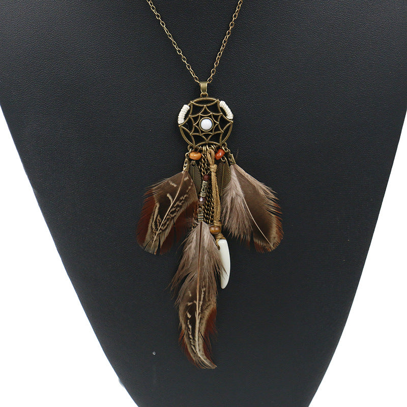 Vintage hollow round feather necklace