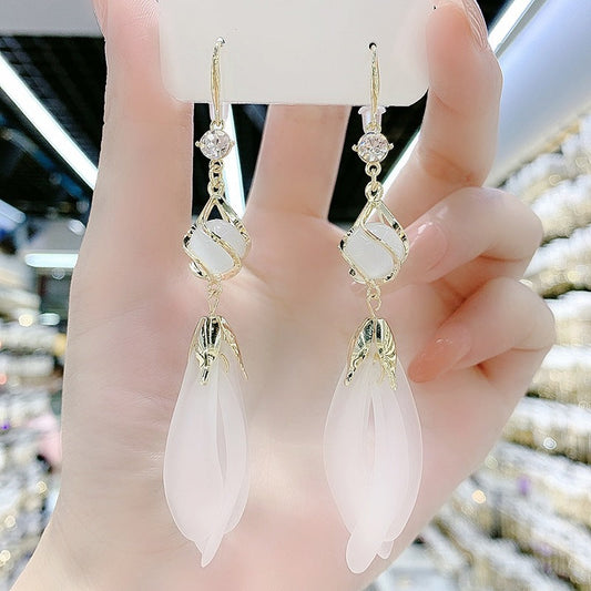 Long fringed opal white petal earrings