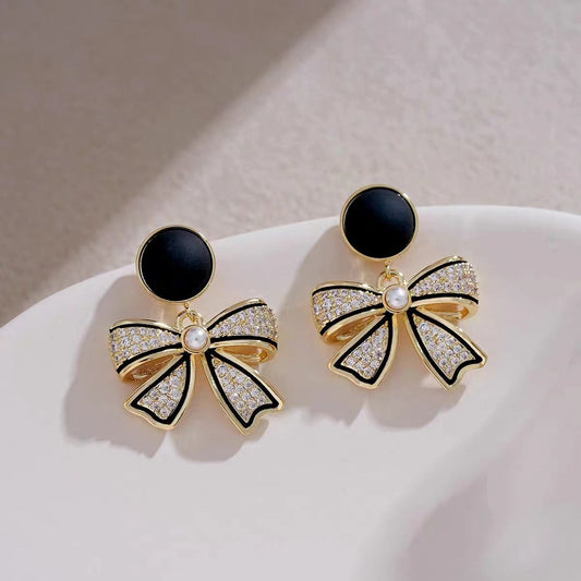 Black bow earrings