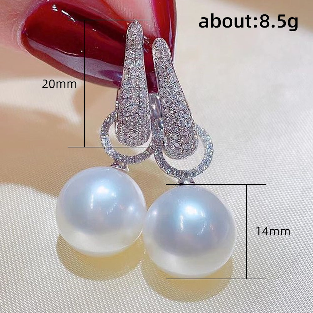 Huitan Temperament Elegant Simulated Pearl Dangle Earrings for Women Sparkling Cubic Zirconia Silver Color Earrings 2022 Jewelry