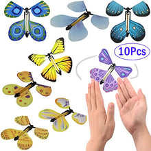 Load image into Gallery viewer, 1-10Pcs Magic Wind Up Flying Butterfly in The Book Rubber Band Powered Magic Fairy Flying Toy Great Surpris Gift Party Favor